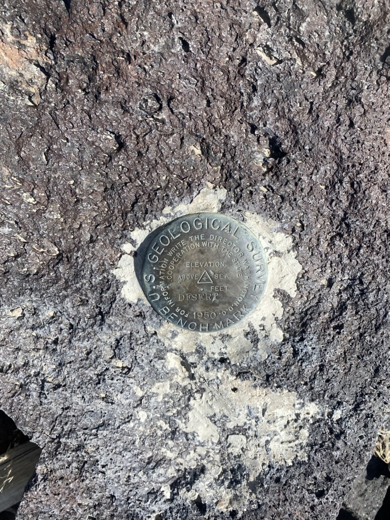 USGS benchmark disc stamped DESERT at the Desert Peak summit, 1950