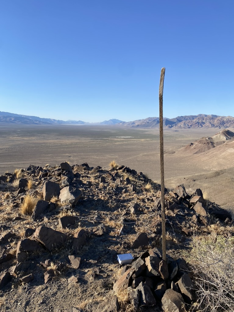 Summit view with the fallen node at the base of the mast